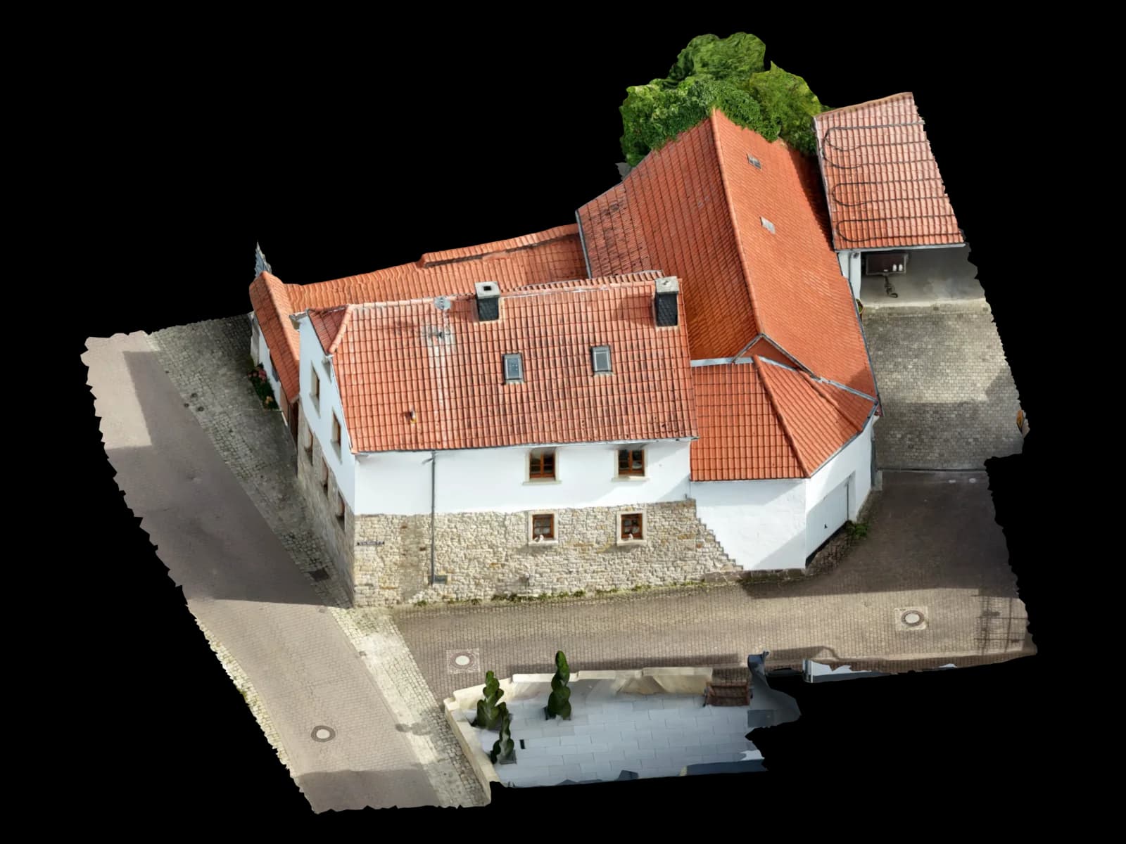 Texturiertes 3D-Modell eines echten Gebäudes mit Umgebung in Schrägansicht